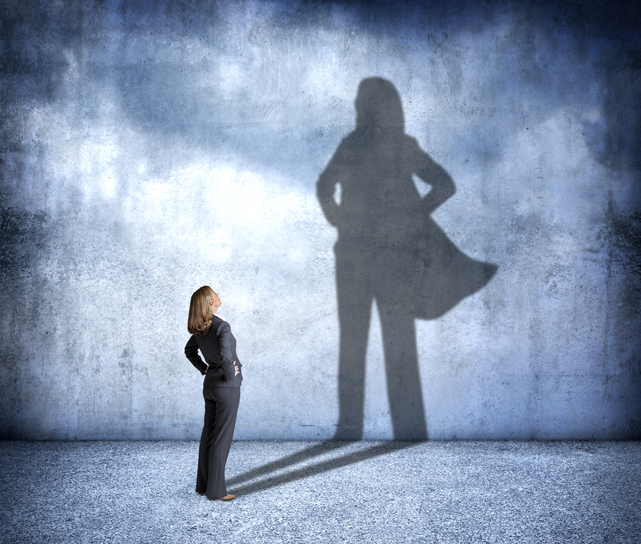 Shadow Of Woman Wearing A Hero’s Cape
